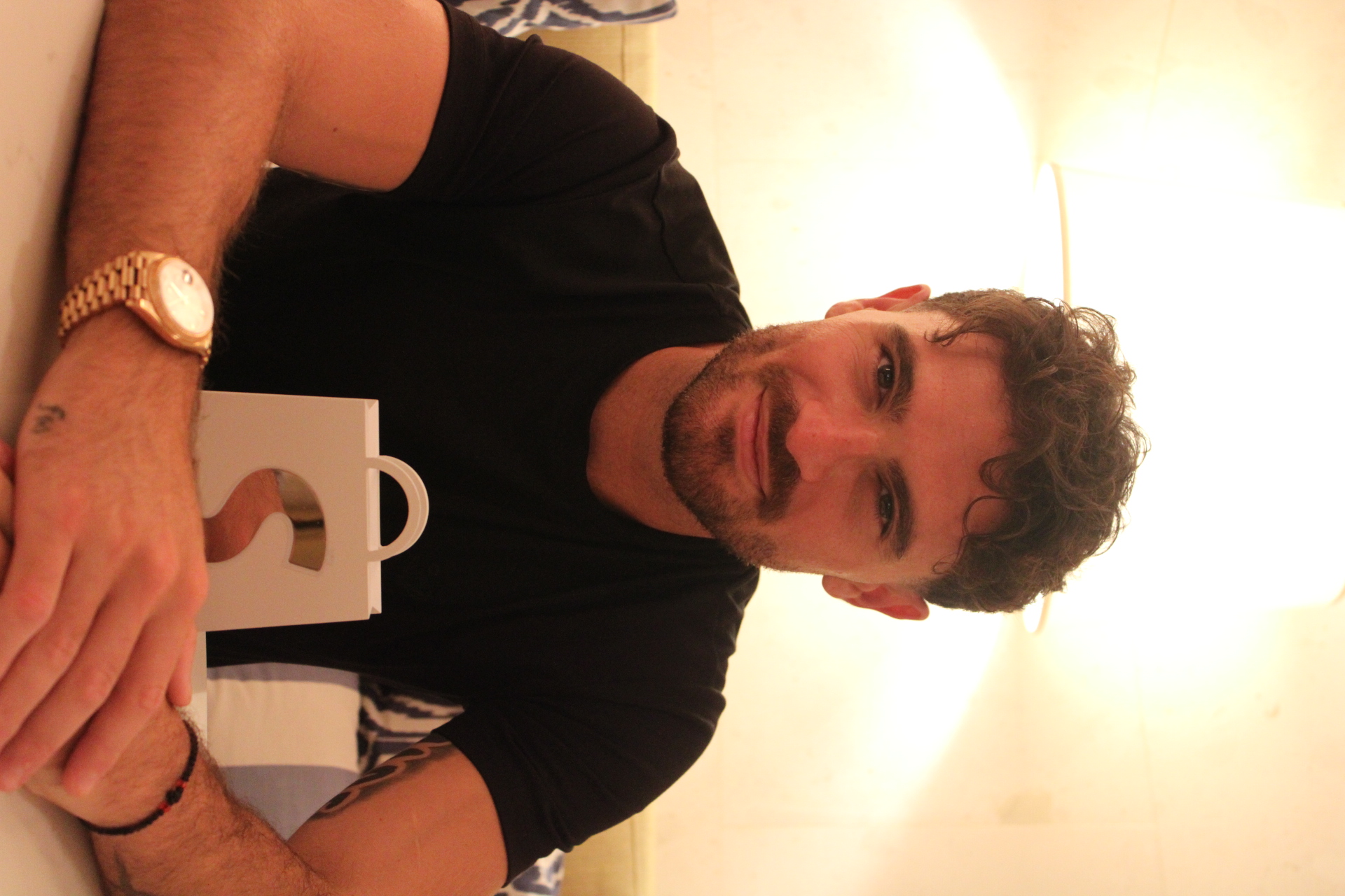Arsen Dimitriou in a black ASTROARSEN tee